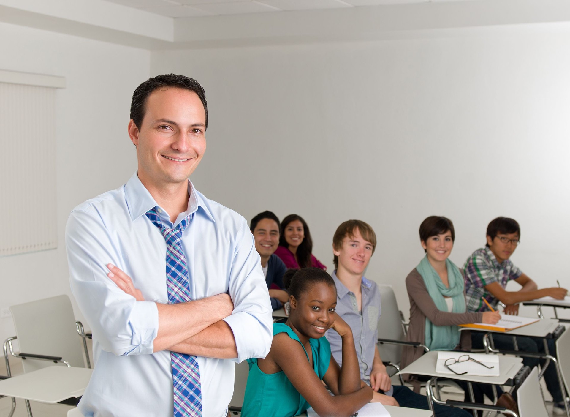 Young teacher with students